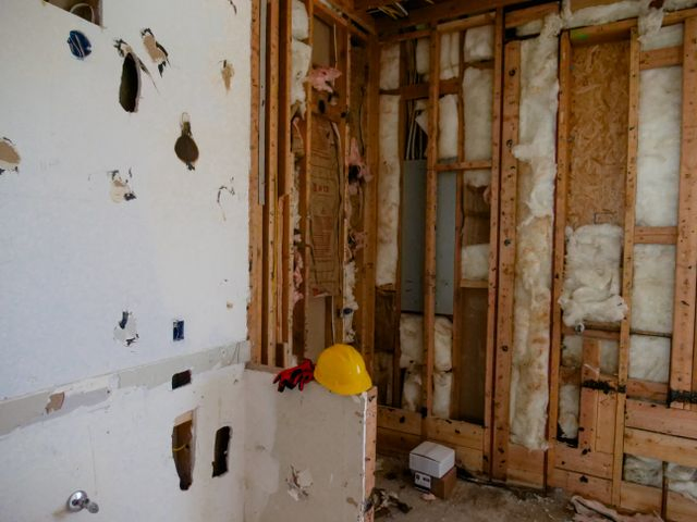 Interior wall opened to the studs during storm damage repairs